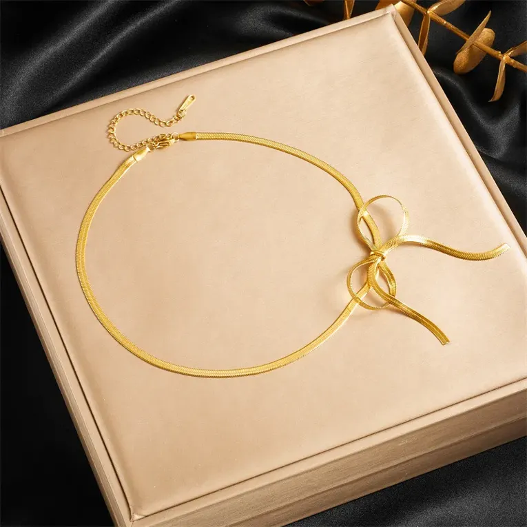 Imitation Gold Plated Bow Shaped Lariat Necklace - Image 1