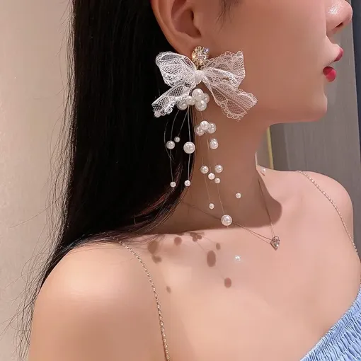 韓国人気【MONDAY EDITION】Pearl Bow Earrings☆追跡付 Designer fashion, Seoul-fully created | W Concept