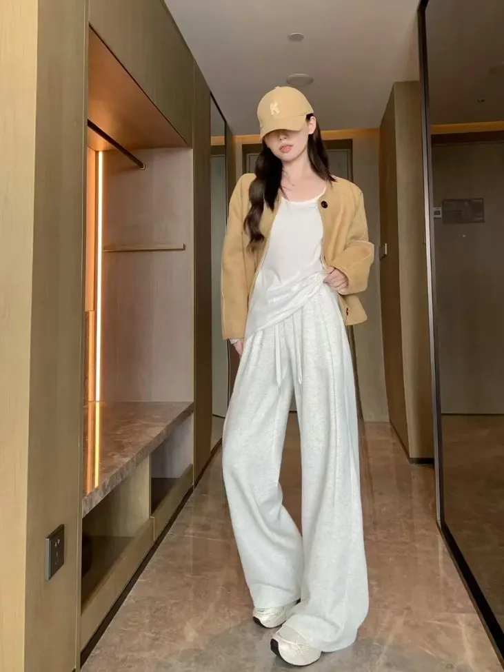 Off White Solid High Rise Trackpants - Image 1