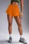 Orange Mid Rise Sports Shorts
