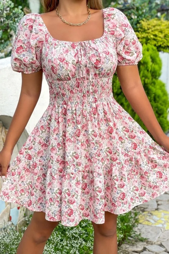Floral Pink Smocked Mini Dress - Image 1