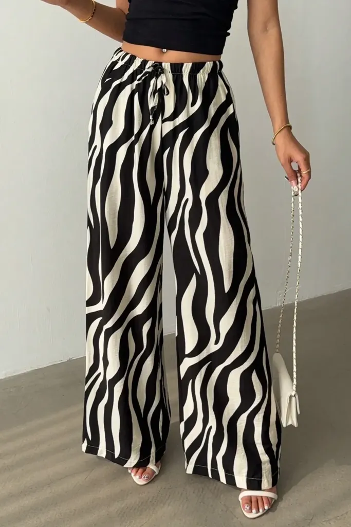Black Mid Rise Animal Print Tieup Pants - Image 1