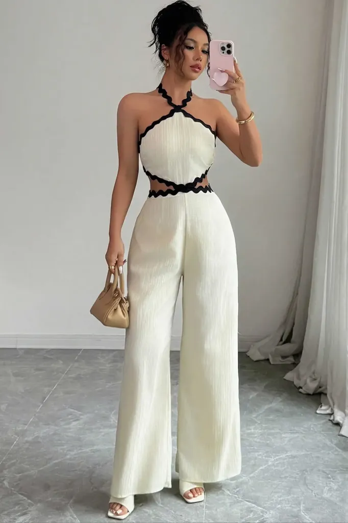 Off White Cut Out Halter Neck Jumpsuit - Image 1