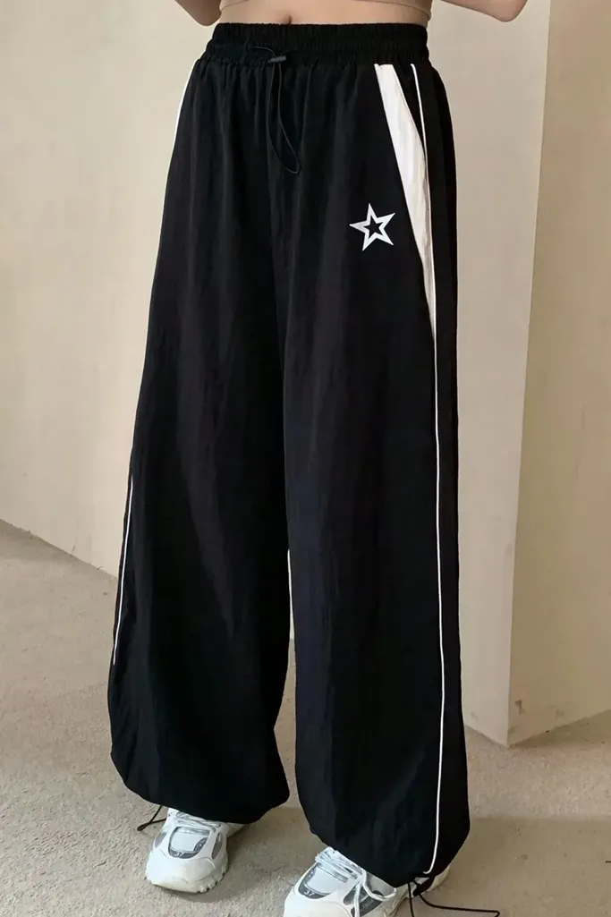 Black Mid Rise Star Print Trackpants - Image 1