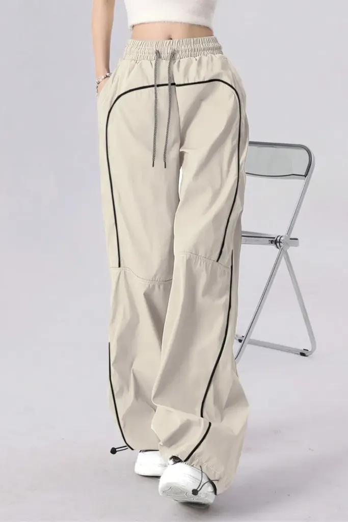 Beige Solid Mid Rise Trackpants - Image 1