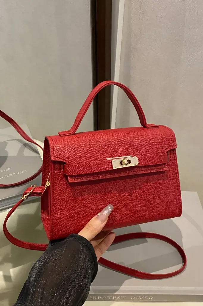 Red Solid Twist Lock Sling Bag - Image 1