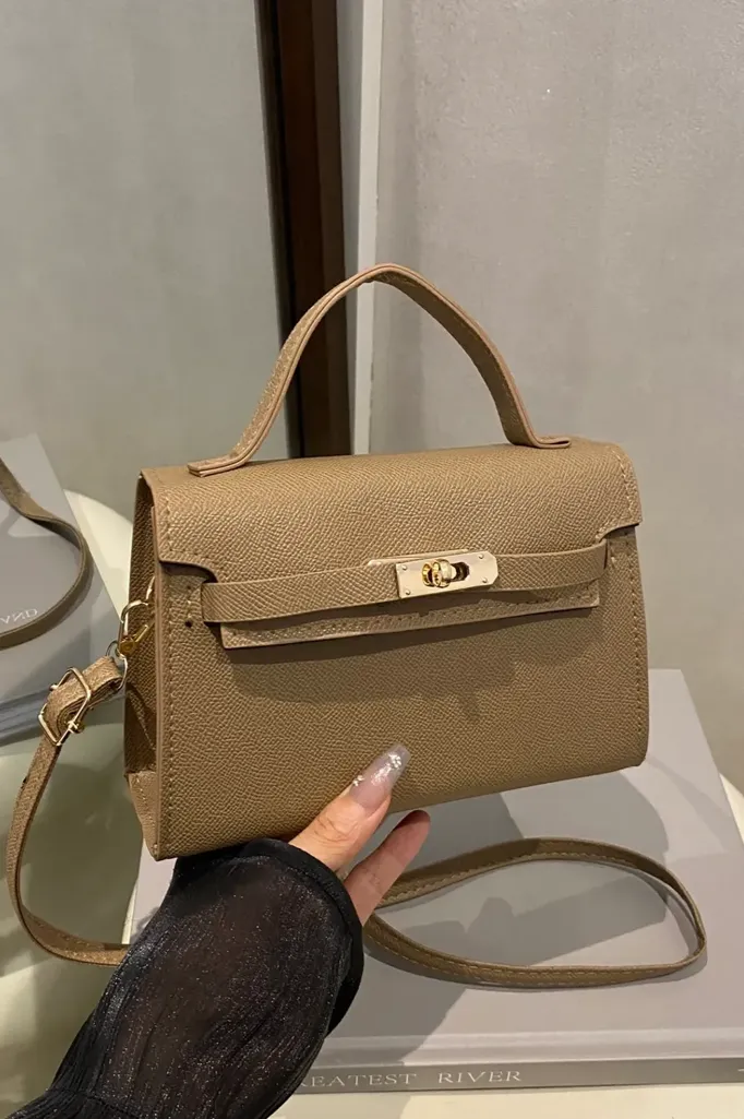 Beige Solid Twist Lock Sling Bag - Image 1