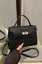 Black Solid Twist Lock Sling Bag