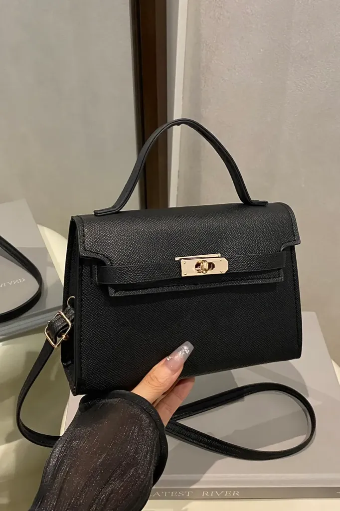 Black Solid Twist Lock Sling Bag - Image 1