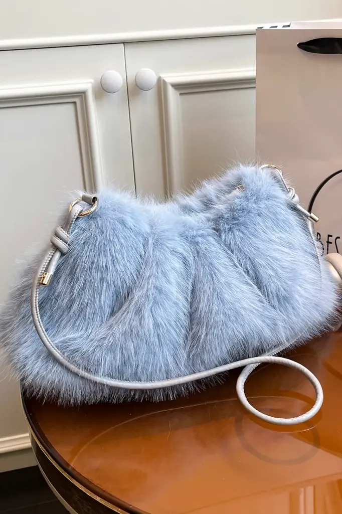 Light Blue Faux Fur Handbag - Image 1