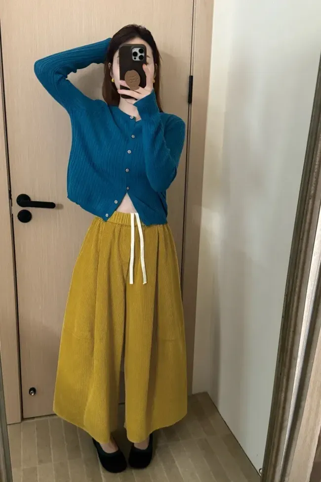 Yellow Mid Rise Pleated Trousers - NEWME