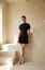 Ananya Panday Inspired Black Solid Peplum Mini Dress