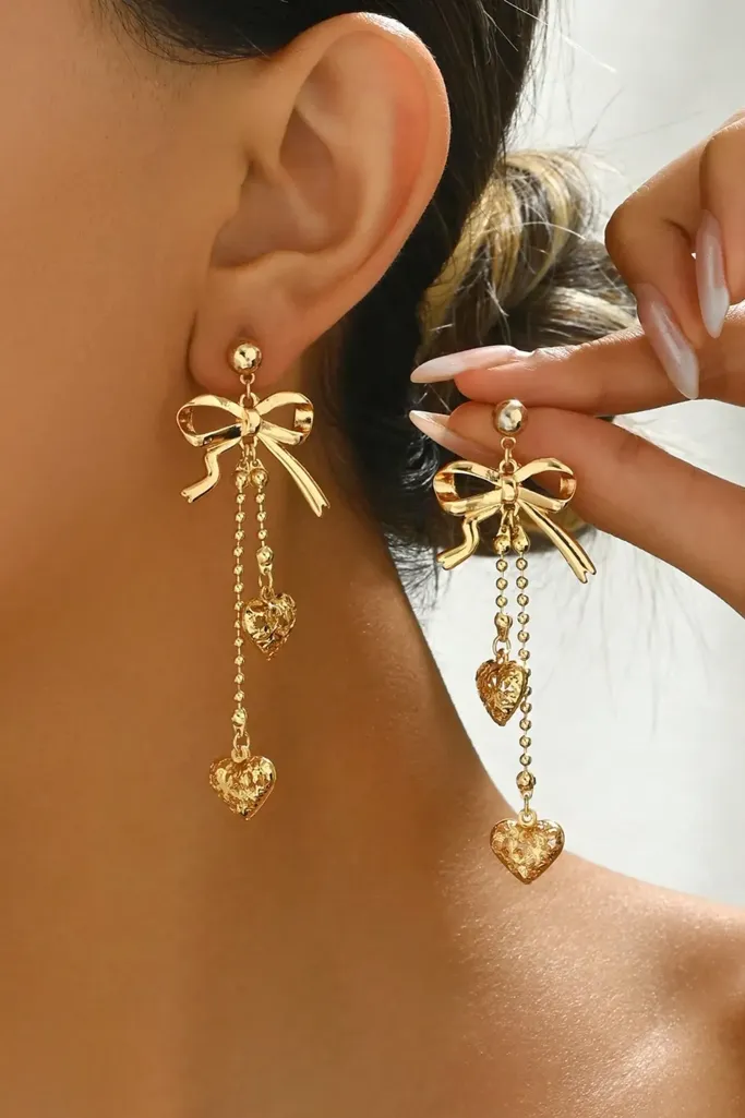 Golden Bow Statement Earrings - Image 1