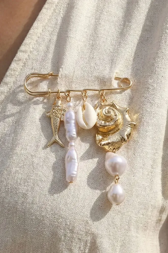 Golden Shell Charm Brooch - Image 1