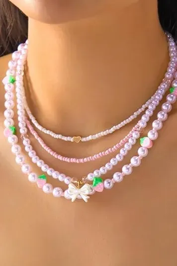 Light Pink Beaded Set Of 4 Necklaces - Image 1