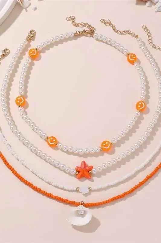 Orange Beaded Set Of 4 Bracelets - Image 1
