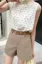 Beige Solid Mid-Rise Shorts