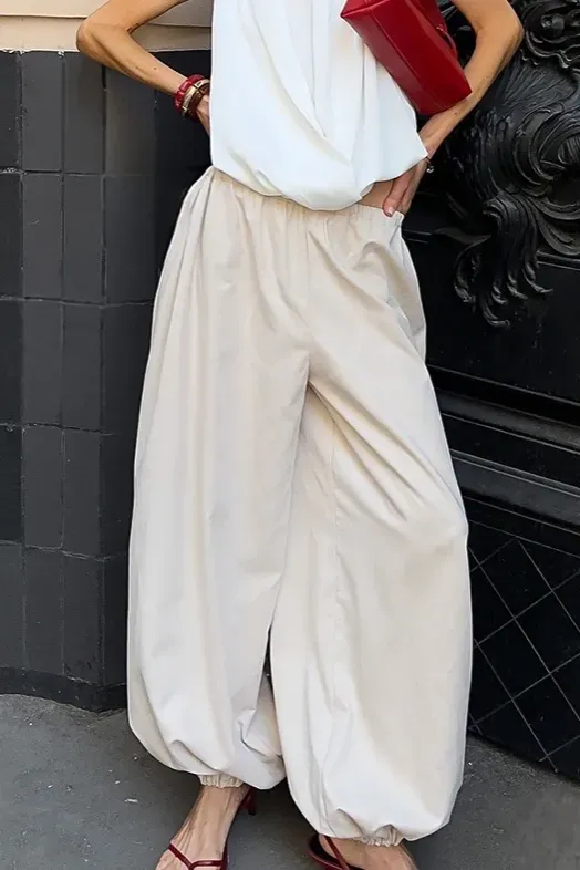Off White Solid Mid Rise Balloon Pants - Image 1