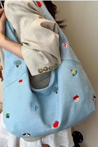 Light Blue Embroidered Denim Tote Bag - Image 1