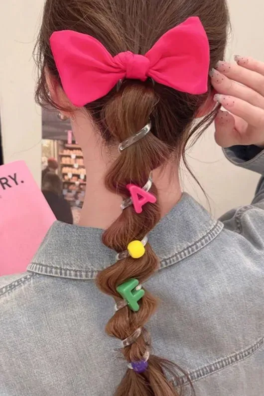 Pink Bow Beaded Hair Tie - Image 1