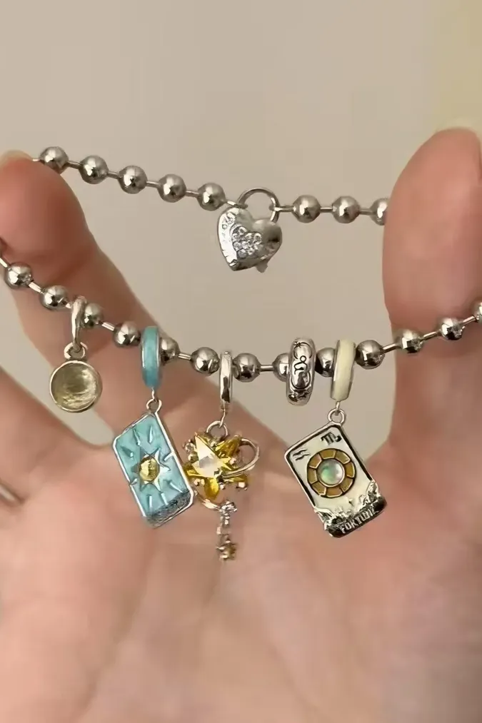 Silver Beaded Charms Bracelet - Image 1