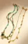 Golden Set Of 2 Beaded Necklace