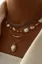 Golden Layered Set Of 4 Necklaces