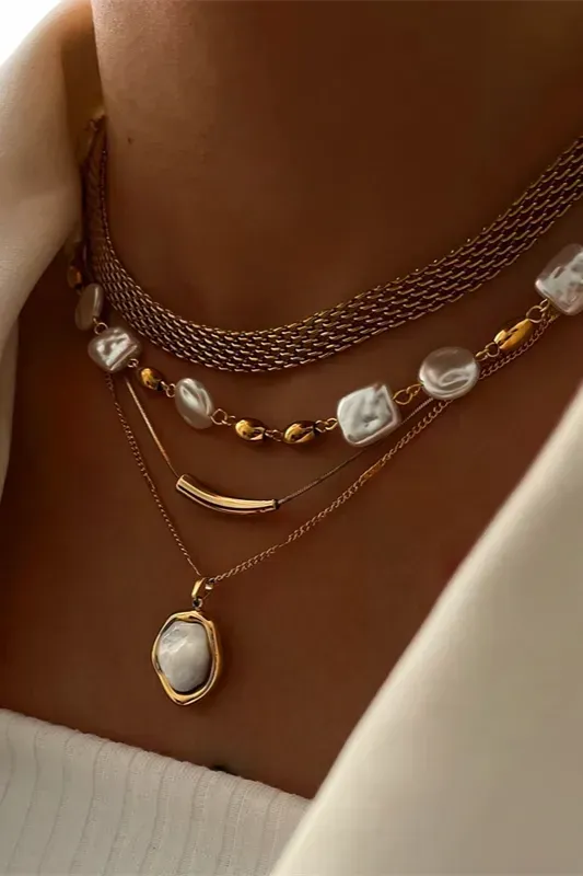 Golden Layered Set Of 4 Necklaces - Image 1
