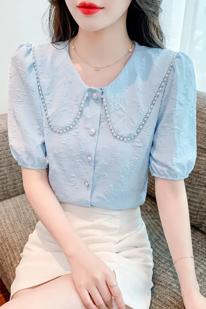 Light Blue Floral Pearl Top - Image 1
