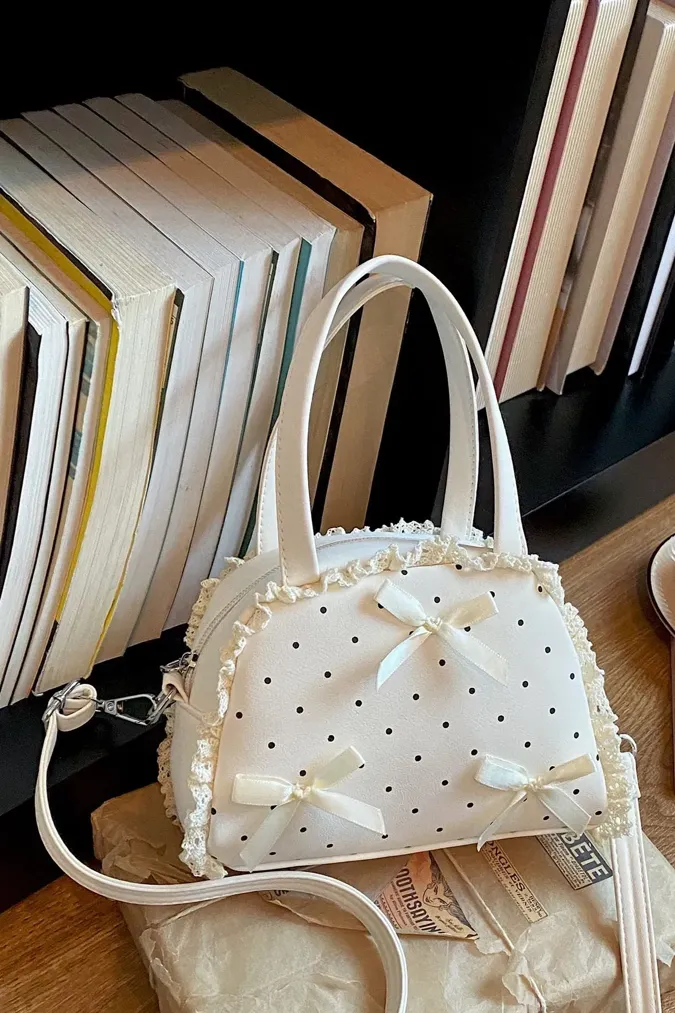 Off White Pu Lace Ruffle Handbag - Image 1