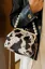 Beige Cow Print Pearl Clutch